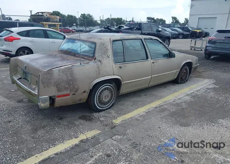 1990 Cadillac Deville z USA, uszkodzony, nr VIN 1G6CD5339L4368410